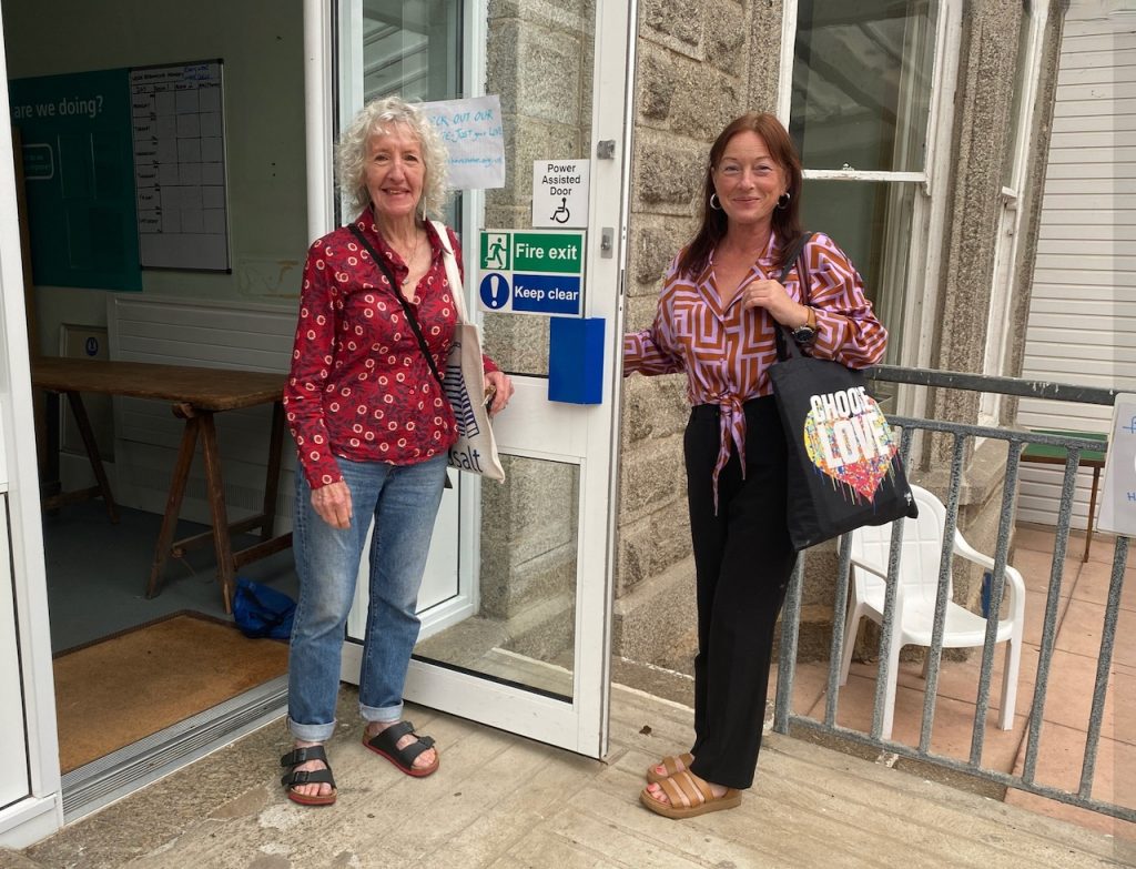 2 women at the front door of the Edward Hain Centre
