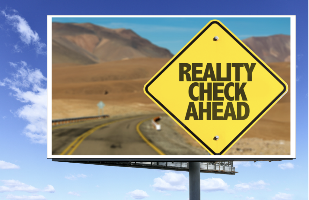 Billboard sign saying 'Reality Check Ahead'