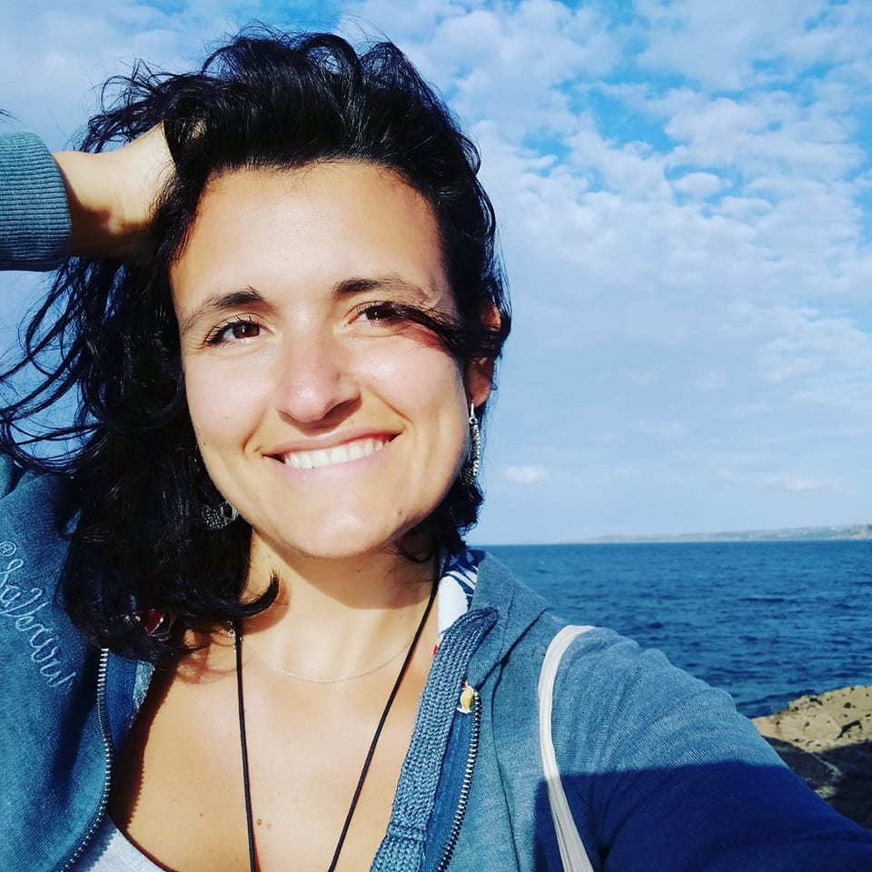 Photo of woman with her hand in windblown hair